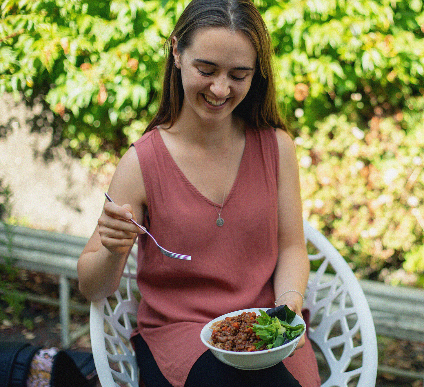 Woman eats plant based food in New Zealand